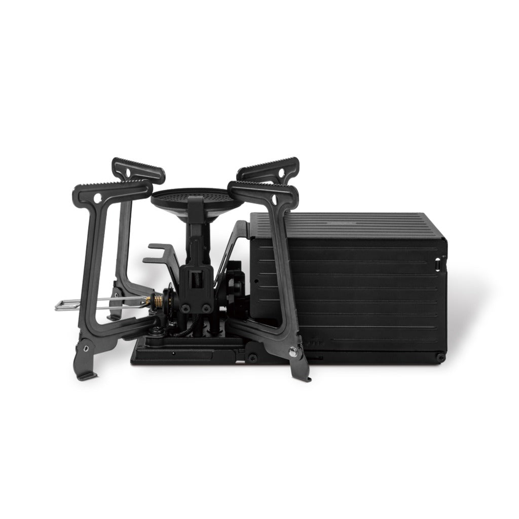 Container Stove in black with the burner unfolded beside the container body