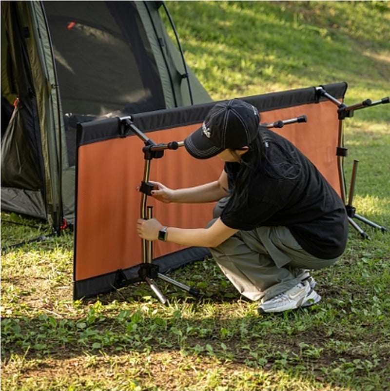 Assembling an accessory panel frame at the campsite