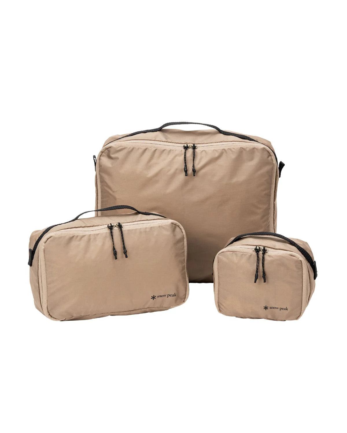 OT Packing Cube, all three sizes shown side by side in tan nylon