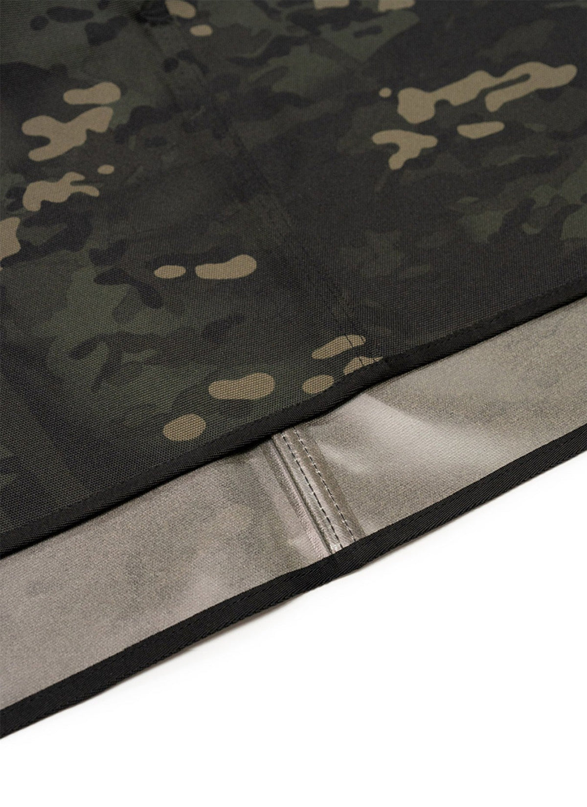 Black Multicam sheet folded back to show the coated underside and sealed seam