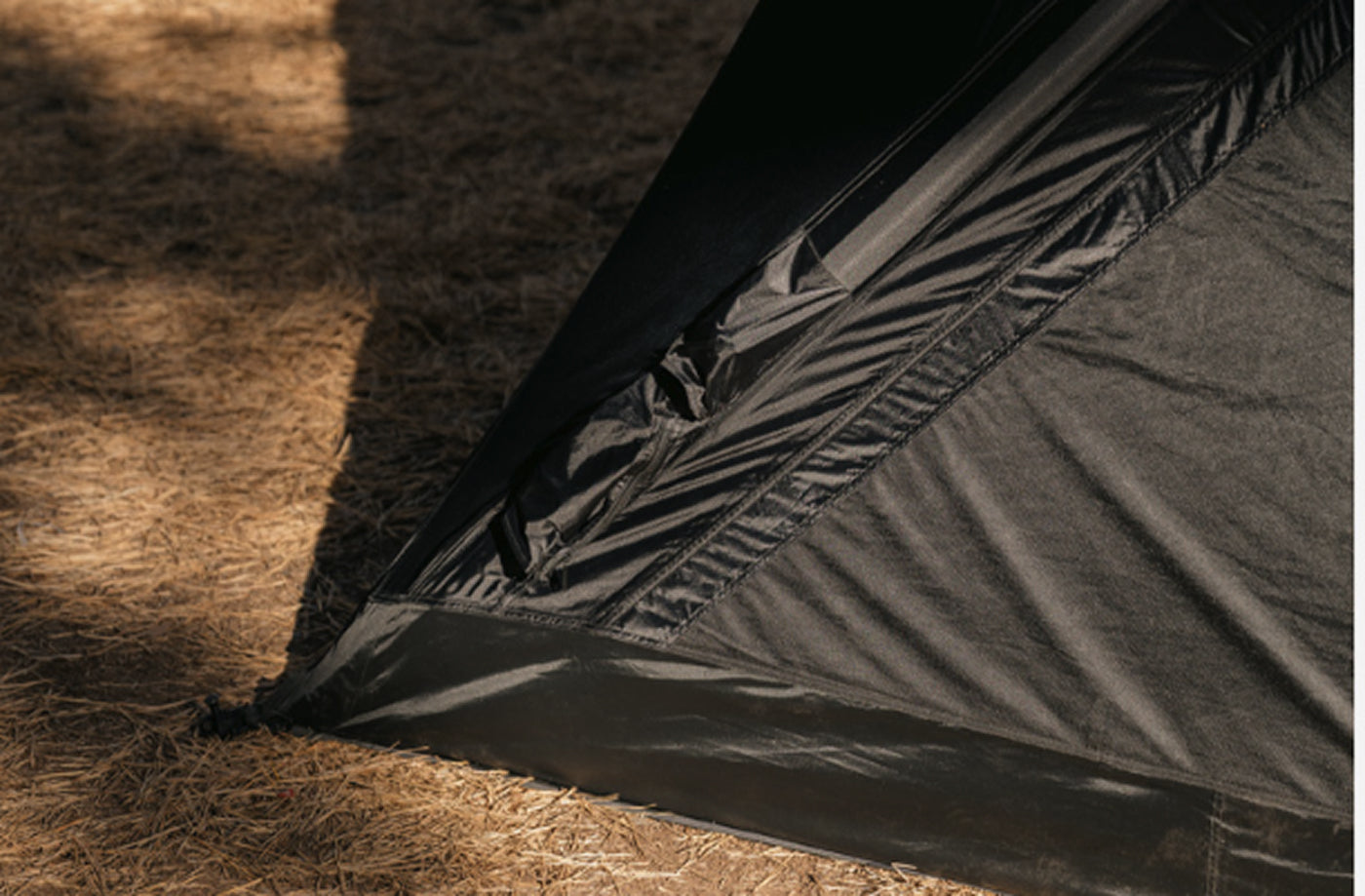 theEarth GEO AIR4 Tent, Black, folded fabric panel showing weave and texture