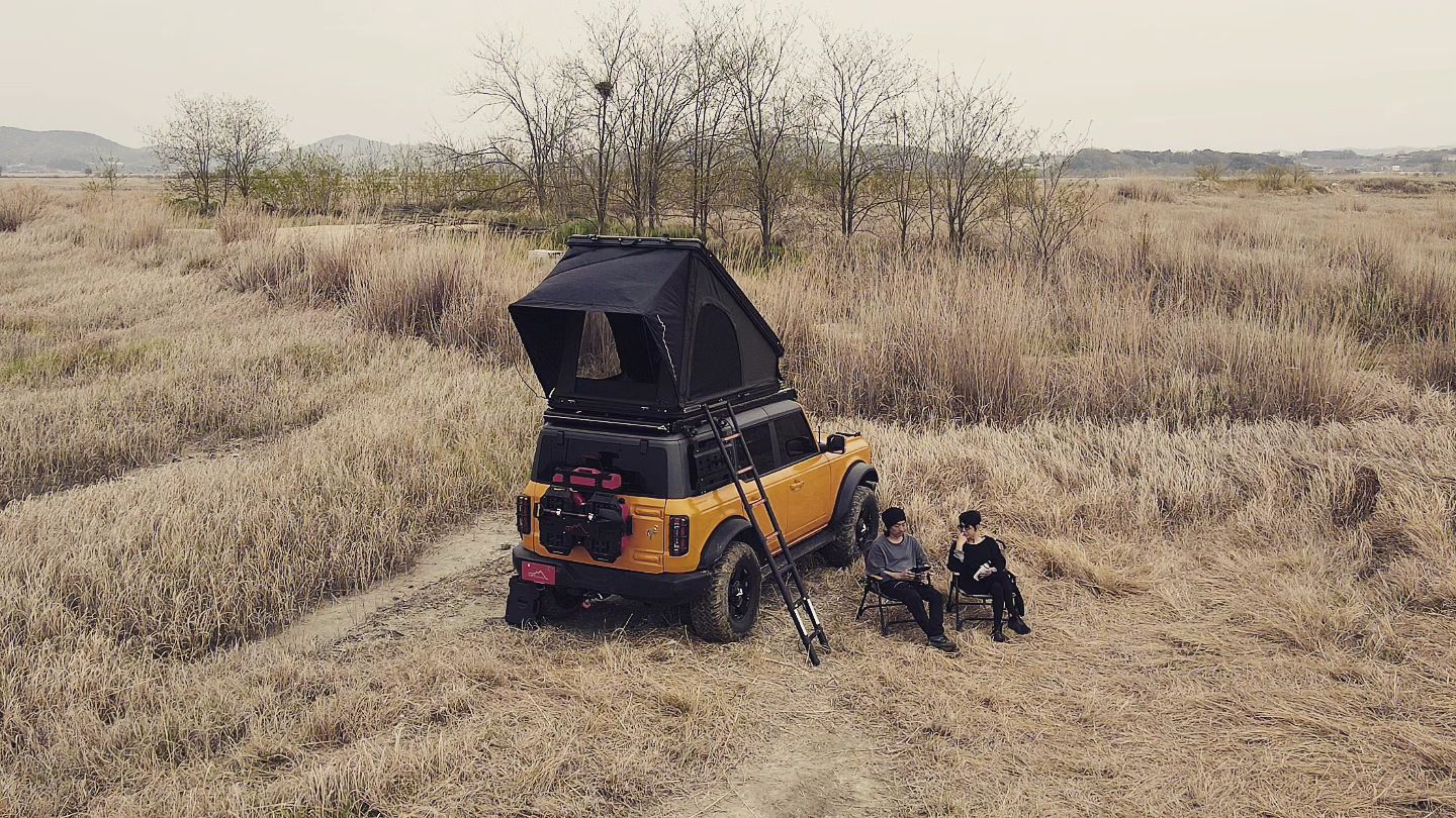 The founder of LNT Overland is sitting on a chair