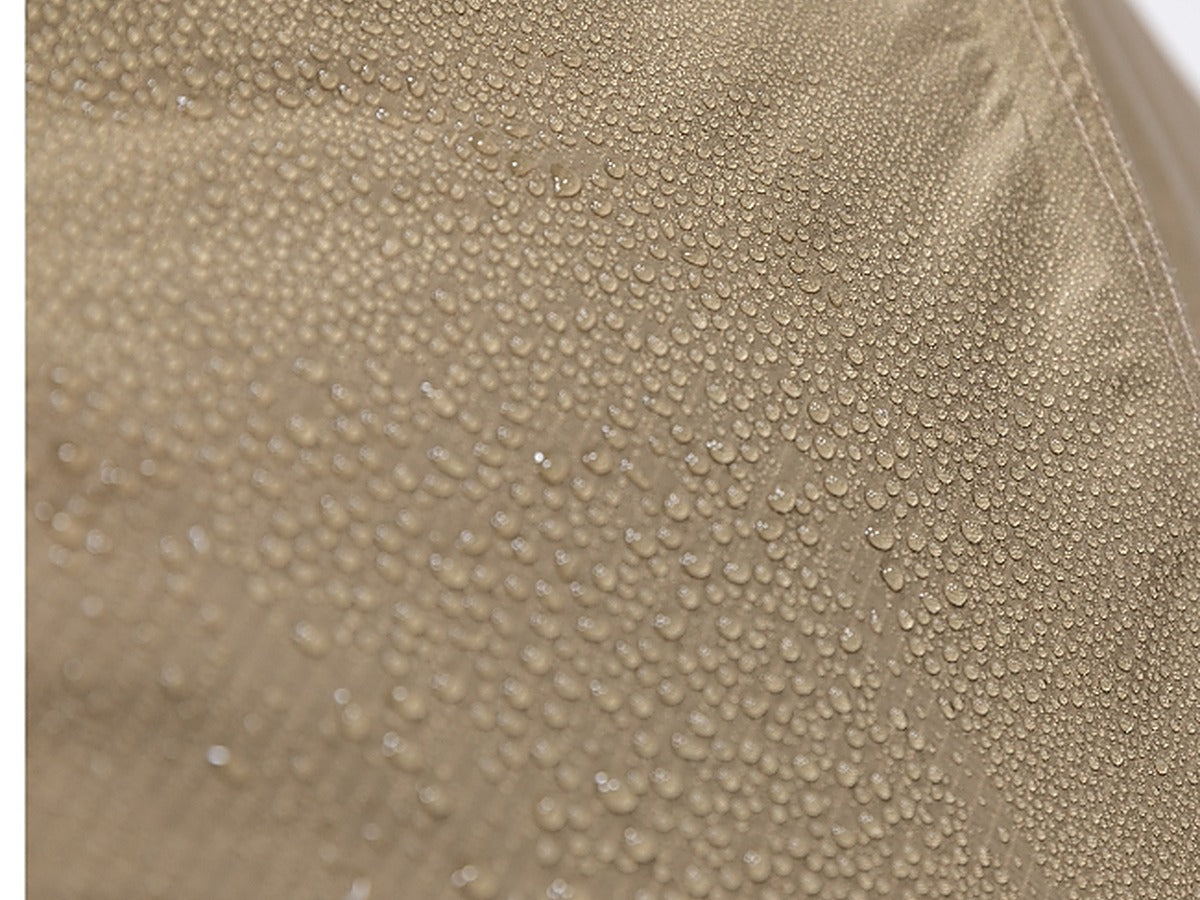 Close-up of the silicone-coated nylon fabric beaded with water droplets