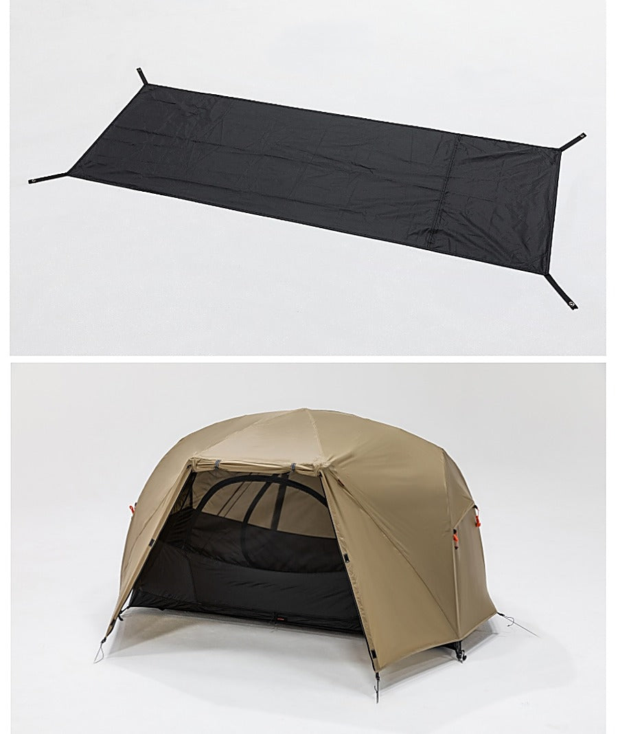 Ground sheet laid flat next to the tent pitched standalone on the ground