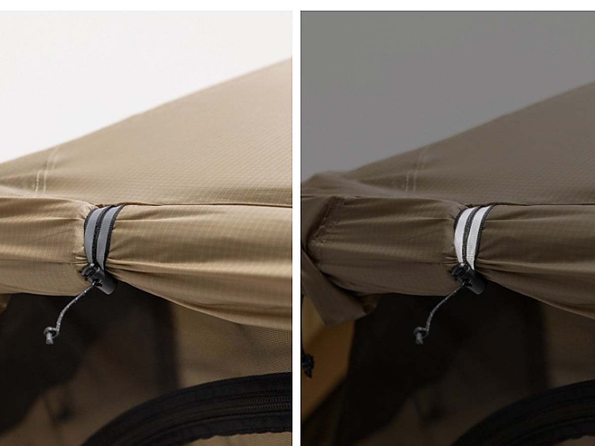 Door-fixing webbing shown lit up and reflective in low light