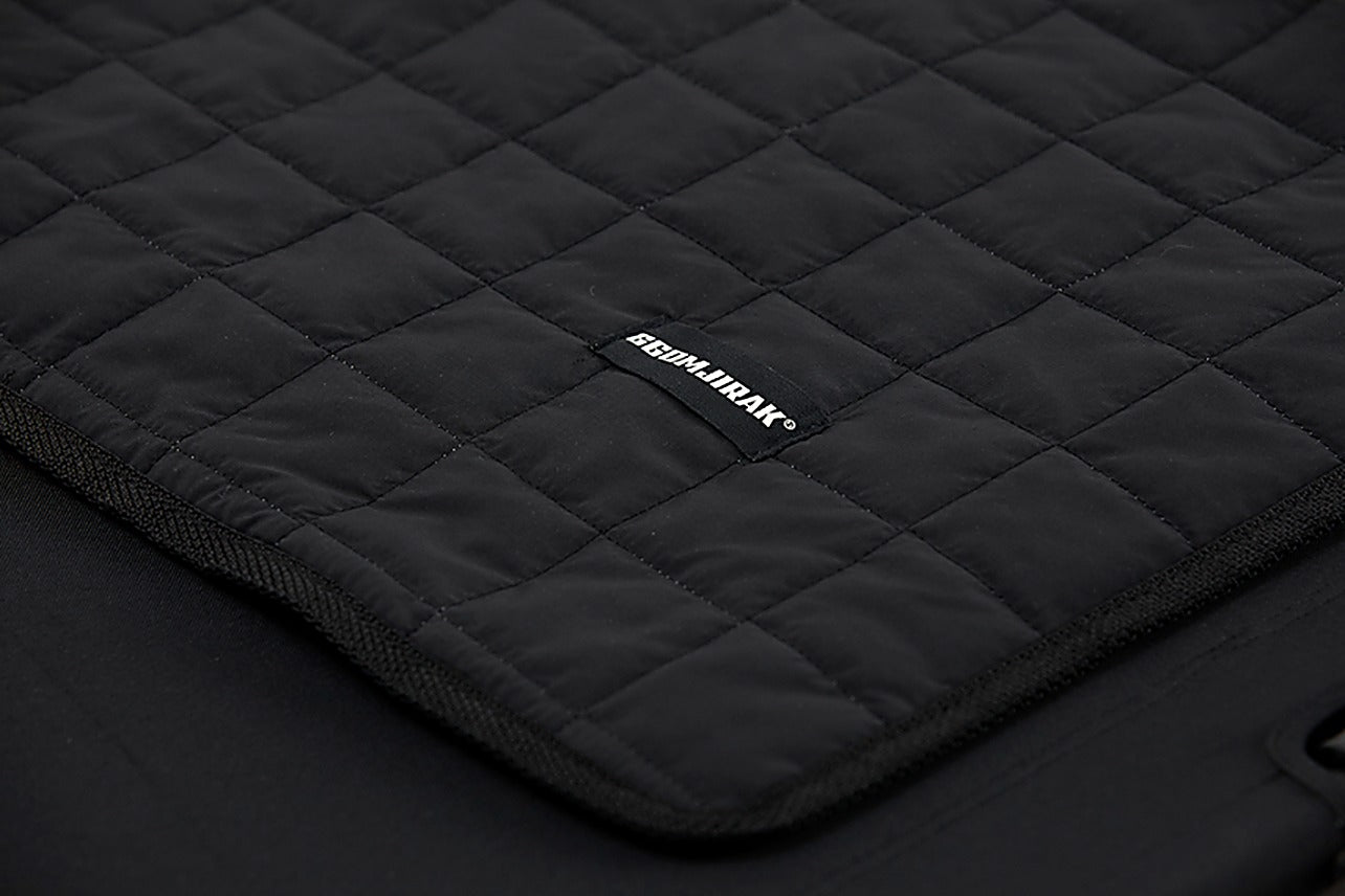 Carbon heating pad lying open on its own