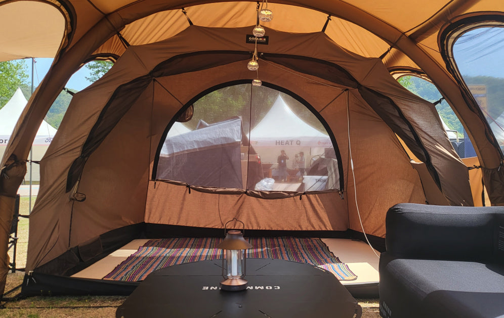 Interior ceiling of the cotton inner tent with a hanging lantern