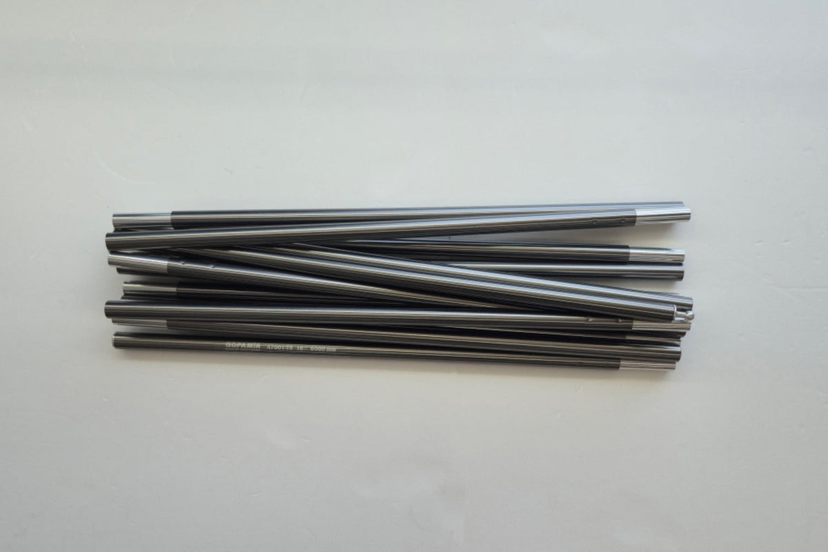 Spare pole segments laid out showing duralumin finish