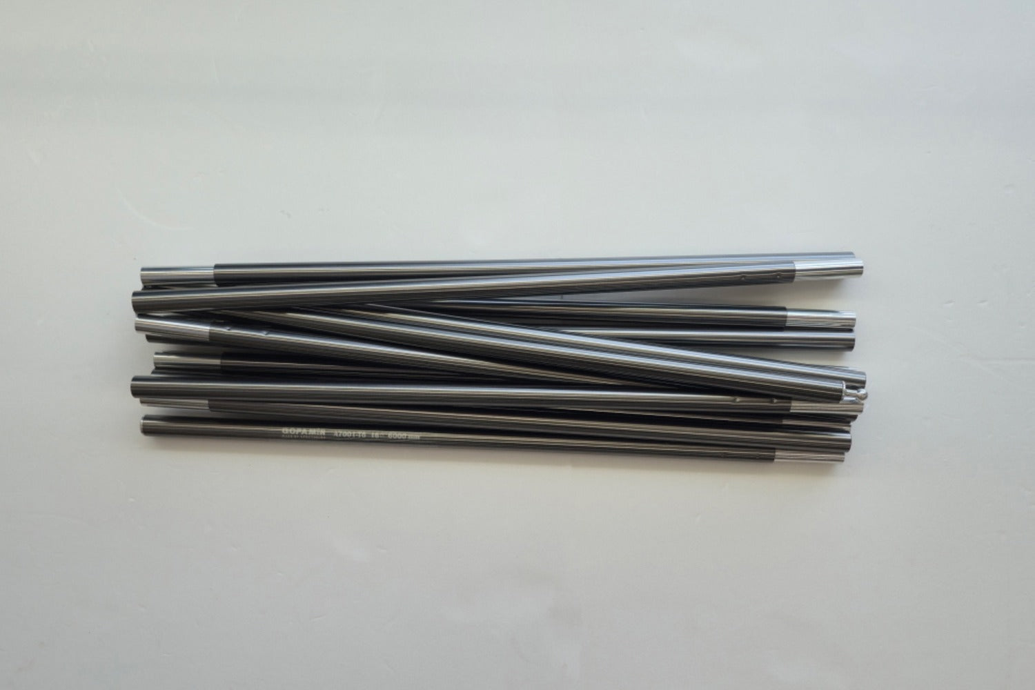 Spare pole segments laid out showing duralumin finish