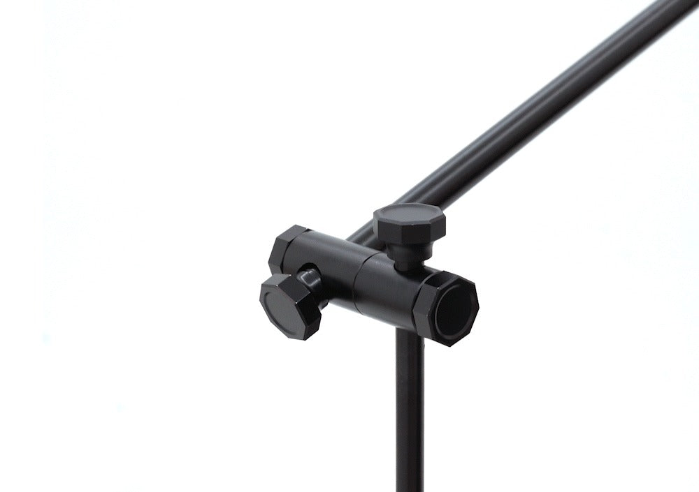 BUENOFE IGT Lantern Hanger installation step 3: close-up of the hanger pole seated in the angle bracket, locked at the set angle with the hex thumb screw.