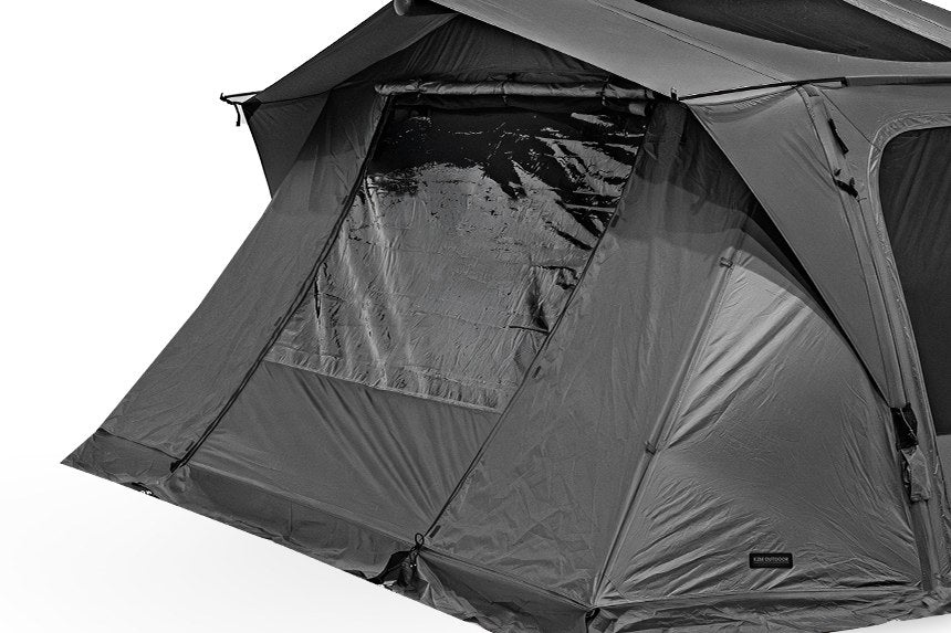 Smog panel folded next to its storage bag showing 22 by 8 by 43 cm packed dimensions