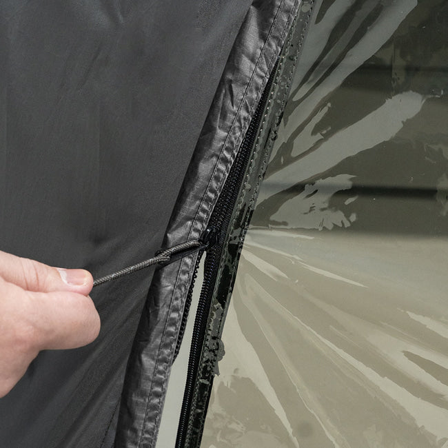 YKK zipper on TPU panel being engaged on shelter door frame