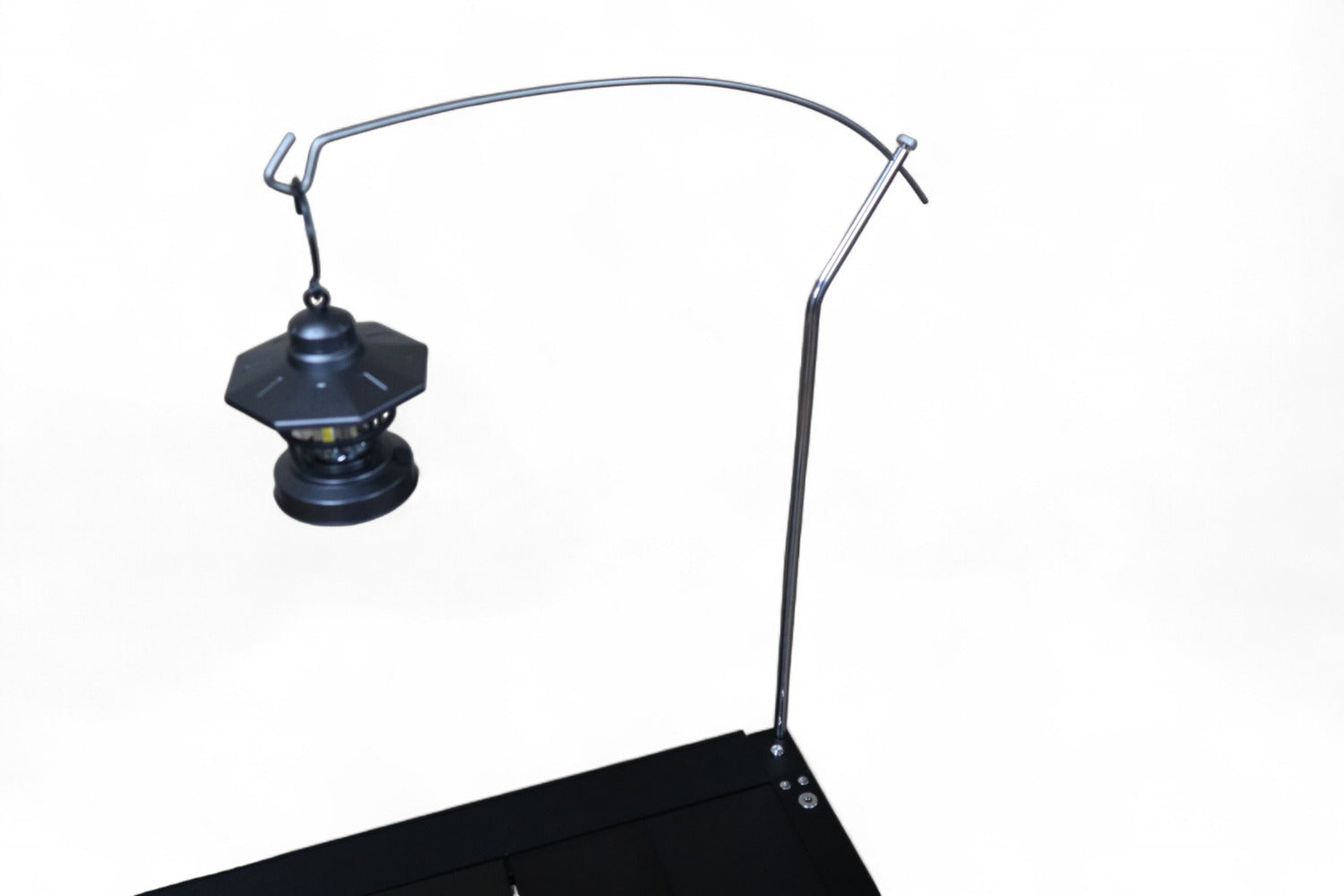 Lantern hanging over the table from the 580 mm arm of the Biloc lantern hanger.
