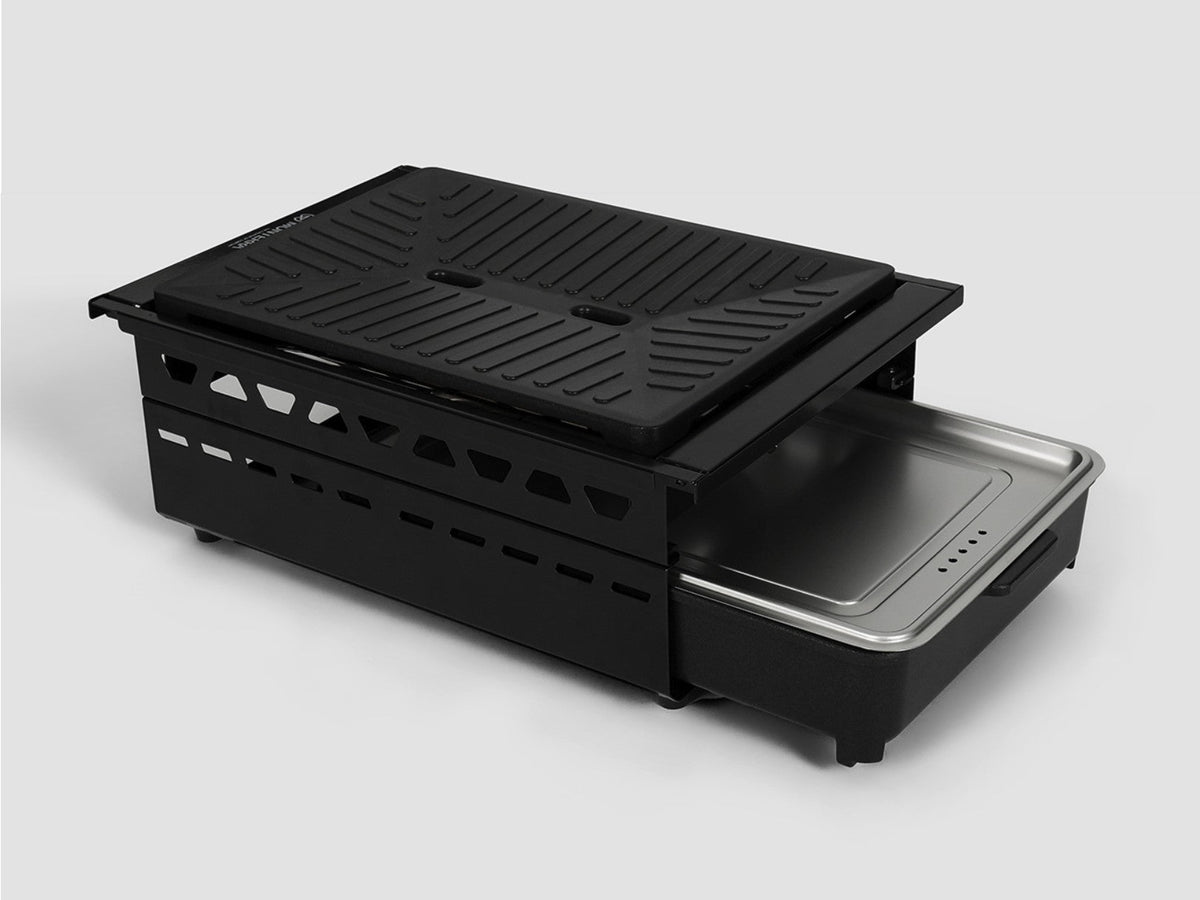 The Add-on Multi Burner with the covered hot pot pan slid into the burner body