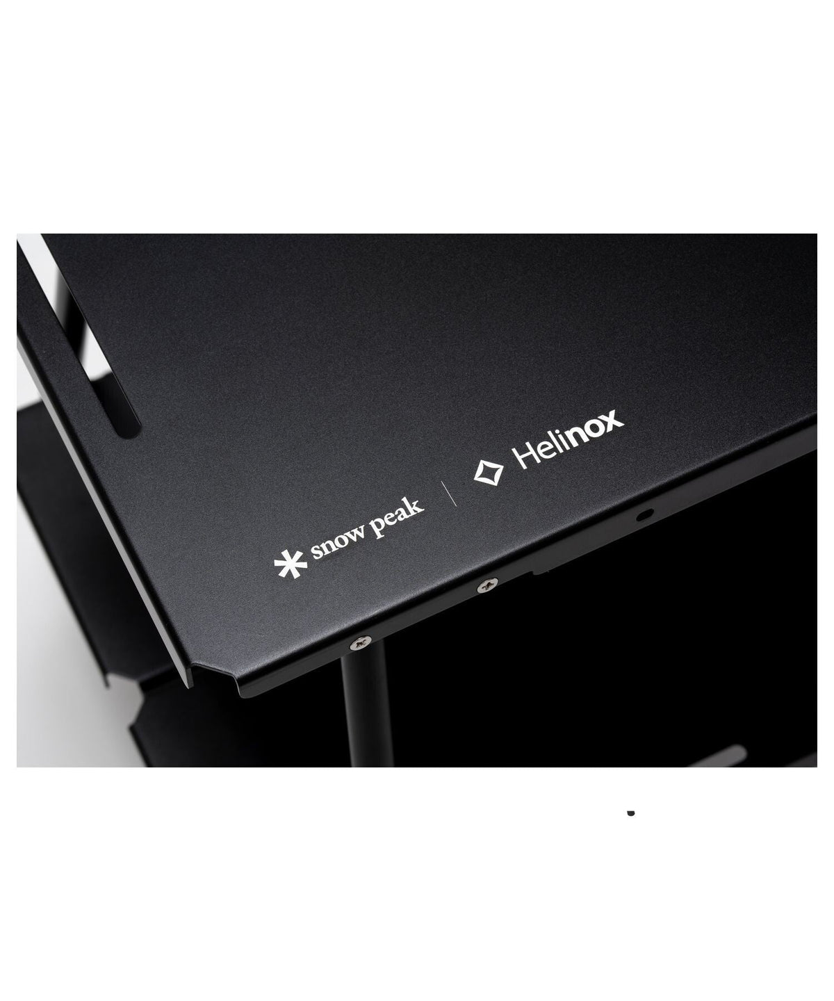 Noga Table, Black, close-up of the Snow Peak x Helinox mark on the top