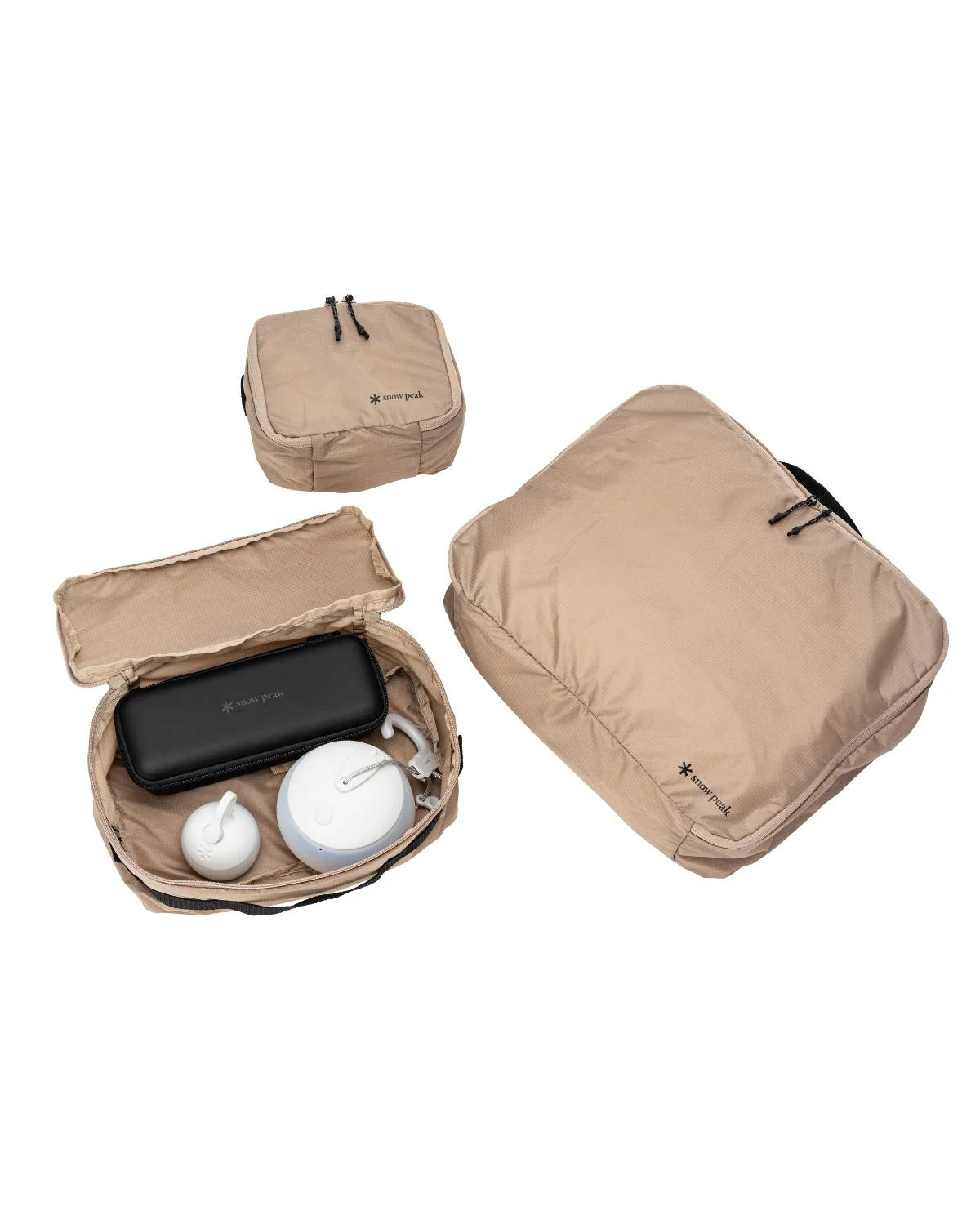 OT Packing Cube opened to show cables and small accessories packed inside