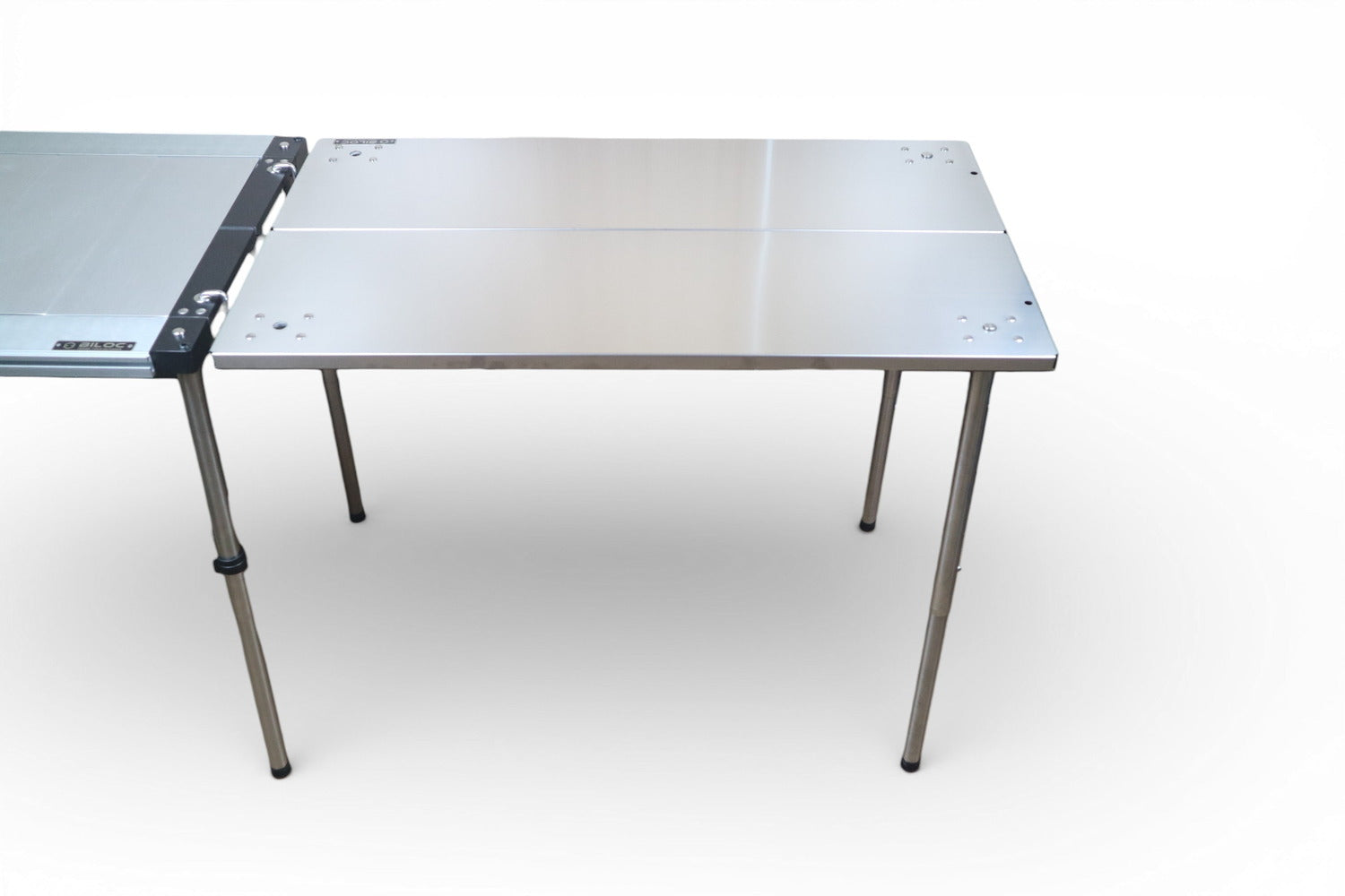 The Silver Ribera on four legs, joined at one end to a Biloc IGT rail table.