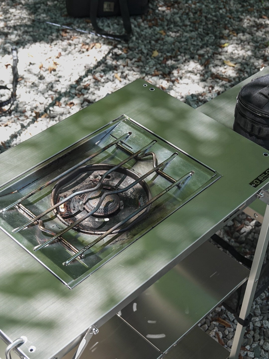 Top view of a gas burner seated in the Biloc Stella shelf IGT bay