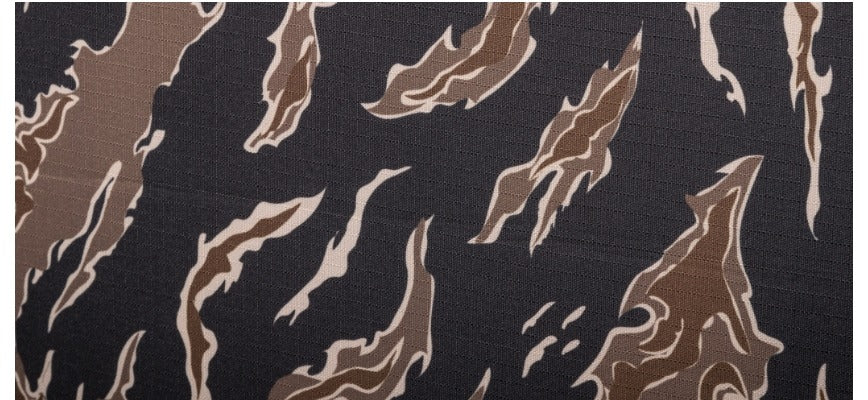 Close-up of the 600D polyester tiger camo fabric texture